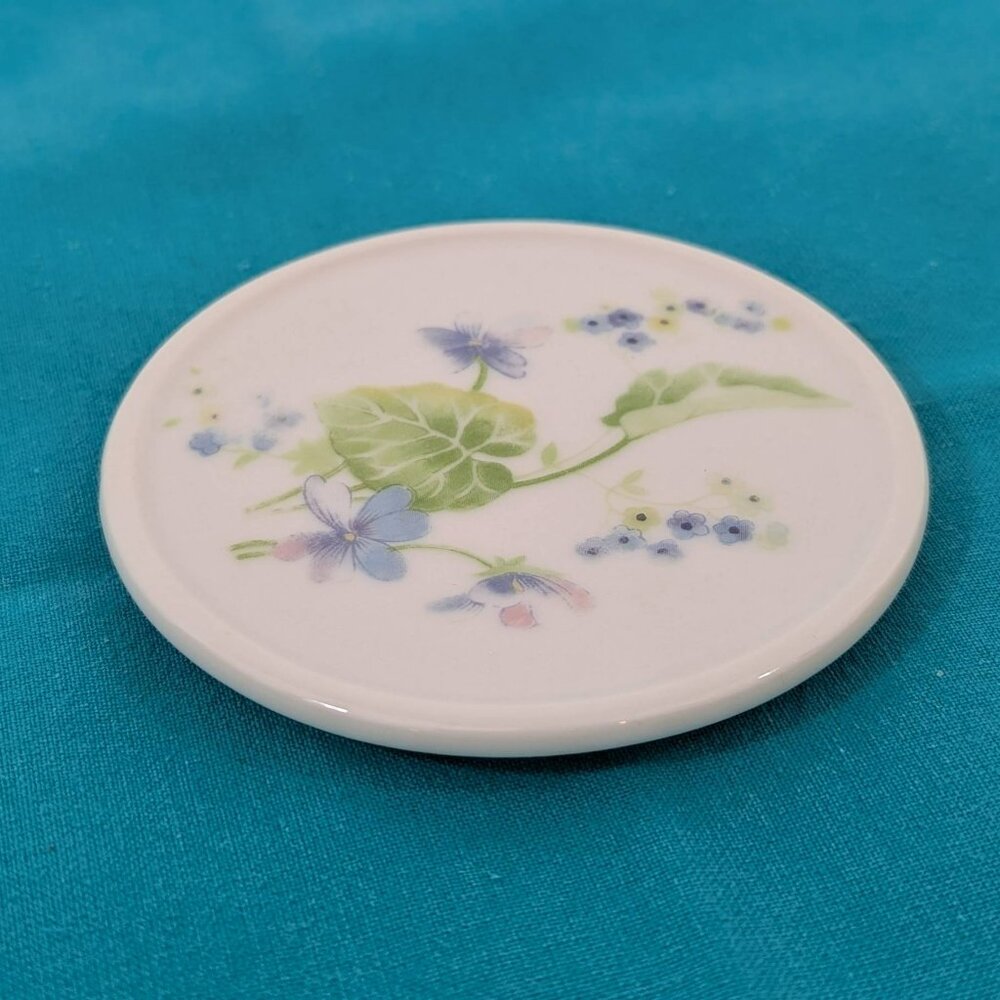 Vintage hand-painted porcelain forget-me-not floral coaster for tea/coffee cup